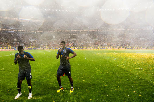 Samuel Umtiti and Paul Pogba of France celebrate