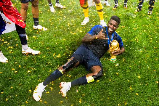 Samuel Umtiti of France celebrate with the trophy