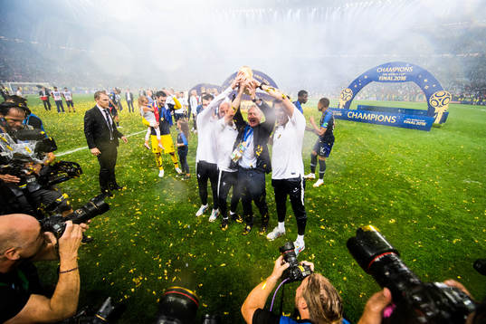 Head coach Didier Deschamps of France and staff celebrate