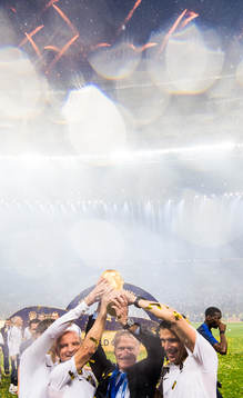 Head coach Didier Deschamps of France and staff celebrate