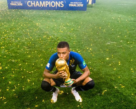 Kylian Mbappe of France celebrate with the trophy