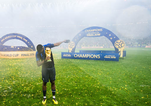 Paul Pogba of France celebrate with the trophy