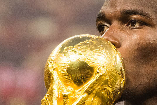 Paul Pogba of France celebrate with the trophy