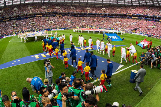 Players of France and of Croatia enter the pitch prior to