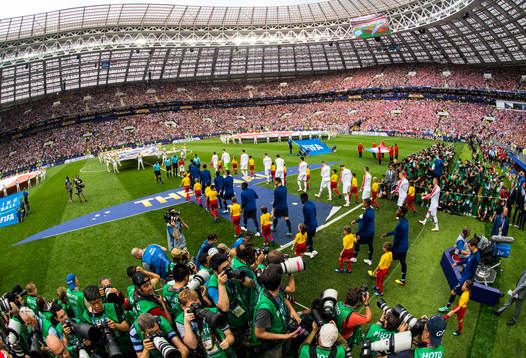 Players of France and of Croatia enter the pitch prior to