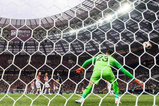 Paul Pogba of France scores the 3-1 goal behind goalkeeper