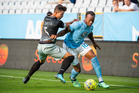 Ardian Limani of Drita competes for the ball with Carlos
