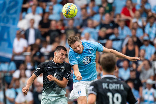 Leotrim Kryeziu of Drita and Lasse Nielsen of Malmö FF