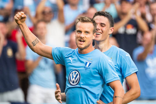 Eric Larsson celebrates with Samuel Adrian of Malmö FF