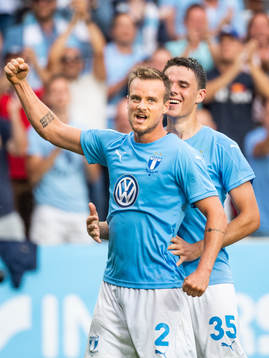 Eric Larsson celebrates with Samuel Adrian of Malmö FF