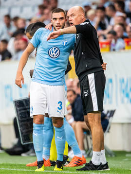 Egzon Binaku of Malmö FF receives instructions from head