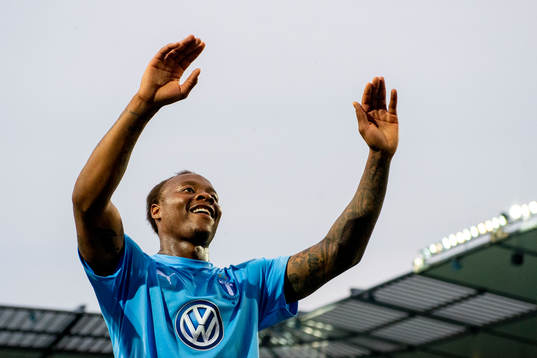 Carlos Strandberg of Malmö FF celebrates with supporters