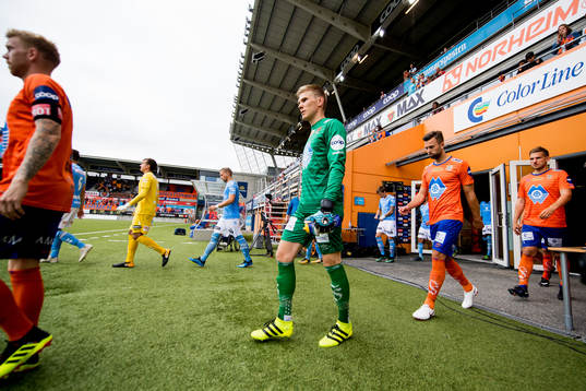 Goalkeeper Andreas Lie of Aalesund enters the pitch