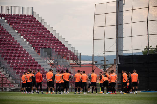 Players of Cluj gather