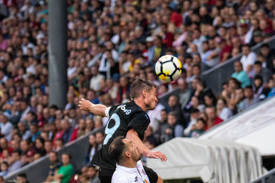 Markus Rosenberg of Malmö FF and Paulo Vinicius of Cluj