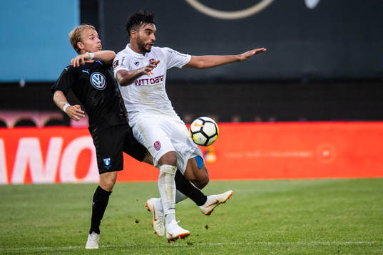 Oscar Lewicki of Malmö FF and Billel Omrani of Cluj