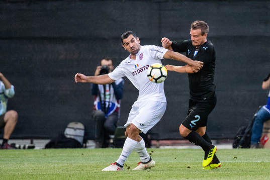 Alexandru Ionita of Cluj and Eric Larsson of Malmö FF
