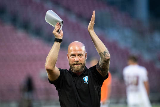 Assistant coach Olof Persson of Malmö FF celebrate