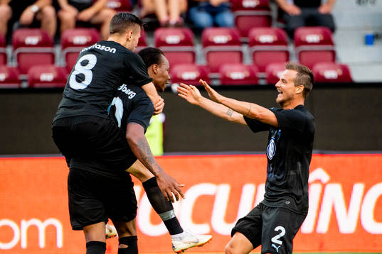 Carlos Strandberg celebrates with Arnór Ingvi Traustason
