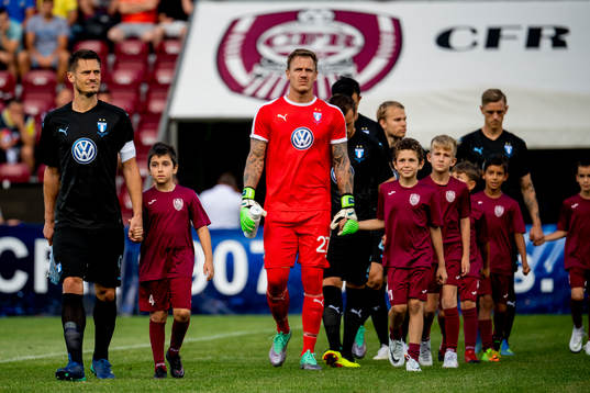 Markus Rosenberg and goalkeeper Johan Dahlin of Malmö FF