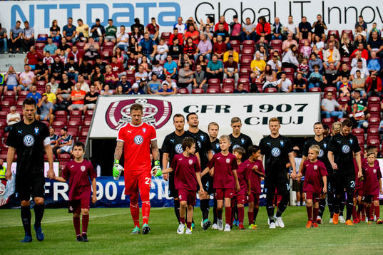 Players of Malmö FF enter the pitch