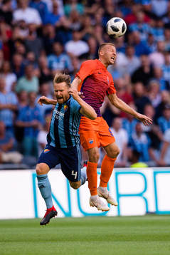 Jacob Une Larsson of Djurgården and Pavlo Polehenko of