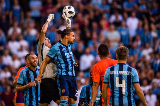 Goalkeeper Rustam Khudzhamov of Mariupol and Erik Johansson