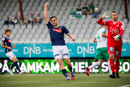 Tommy Høiland of Viking and goalkeeper Lukasz Jarosinski