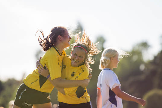 Kira Wiese Møll and Ebba Skuland of Holum IL celebrate