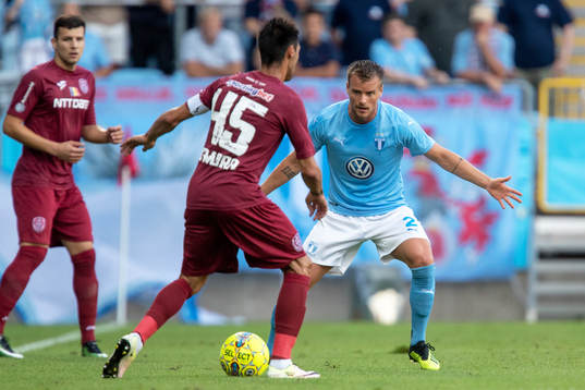 Eric Larsson of Malmö FF and Camora of Cluj