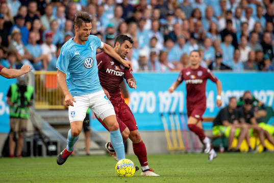 Markus Rosenberg of Malmö FF and Juan Culio of Cluj