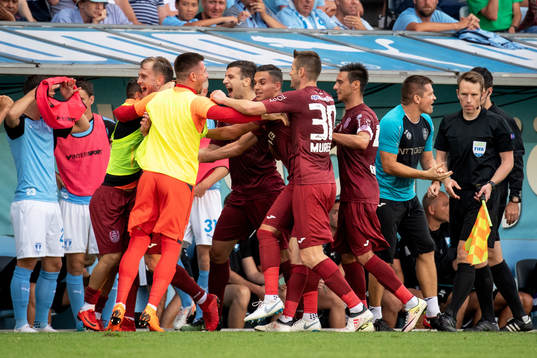 Cluj celebrates with his teammates