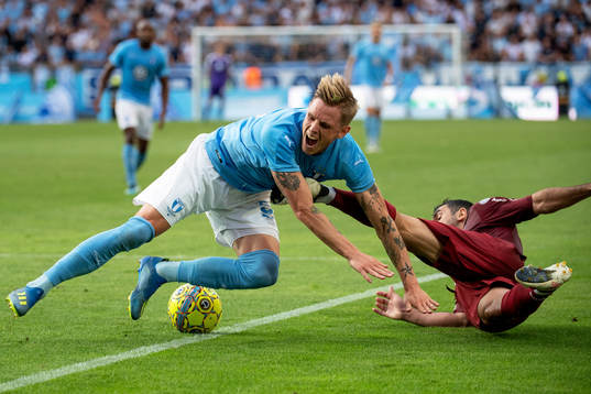 Sören Rieks of Malmö FF and Juan Culio of Cluj