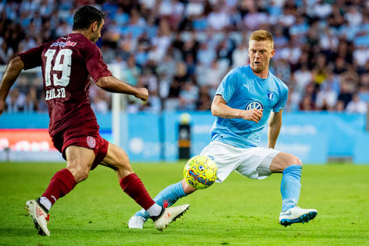 Ciprian Deac of Cluj and Anders Christiansen of Malmö FF