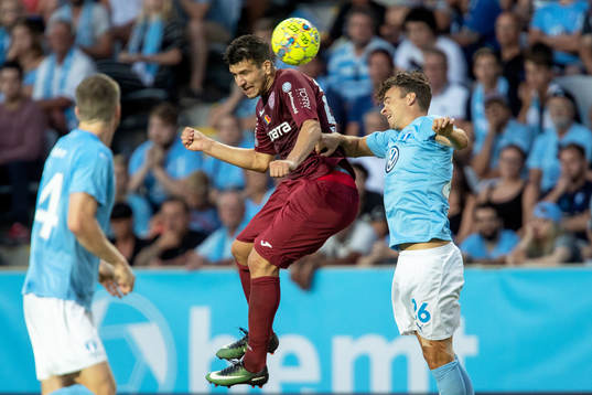 Giuseppe De Luca of Cluj and Andreas Vindheim of Malmö FF
