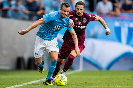 Eric Larsson of Malmö FF and Ciprian Deac of Cluj