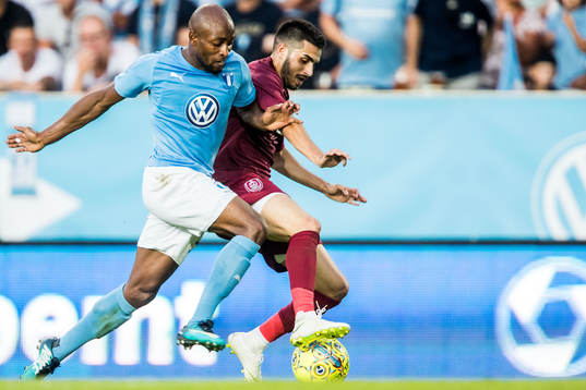 Fouad Bachirou of Malmö FF and Sebastian Mailat of Cluj