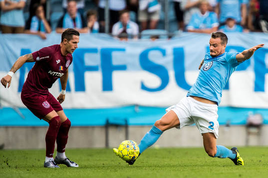 Ciprian Deac of Cluj and Eric Larsson of Malmö FF