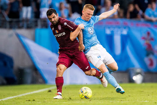 Juan Culio of Cluj and Anders Christiansen of Malmö FF