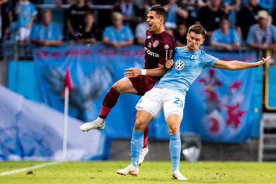 Marcus Antonsson of Malmö FF and Cristian Manea of Cluj