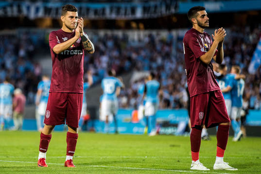 Players of Cluj looks dejected