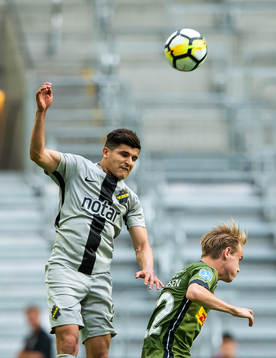 Tarik Elyounoussi of AIK vies with Jacob Christensen of