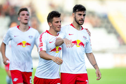Massimo Bruno of Leipzig celebrates with his teammates