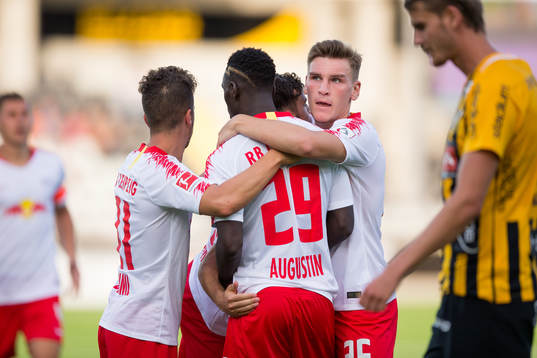 Massimo Bruno of Leipzig celebrates with his teammates