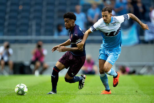 Reiss Nelson of Arsenal and Alessandro Murgia of Lazio