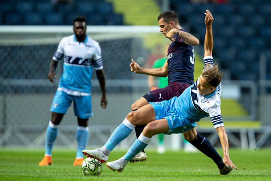 Granit Xhaka of Arsenal and Lucas Leiva of Lazio