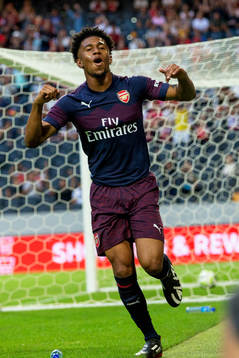 Reiss Nelson of Arsenal celebrates