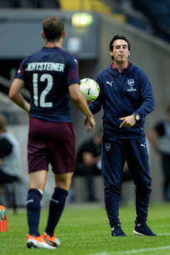 Stephan Lichtsteiner and coach Unai Emery of Arsenal