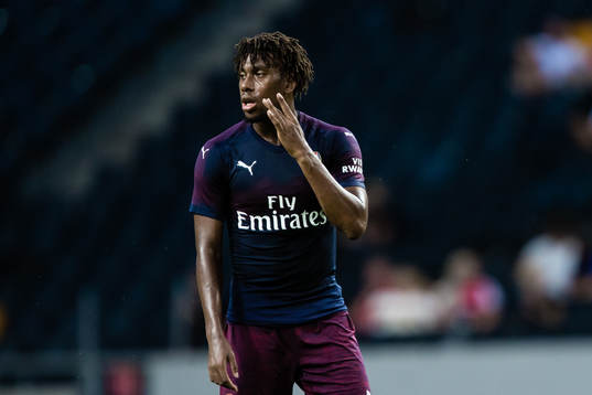 Alex Iwobi of Arsenal looks dejected