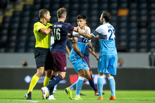 Rob Holding of Arsenal and Joaquin Correa of Lazio